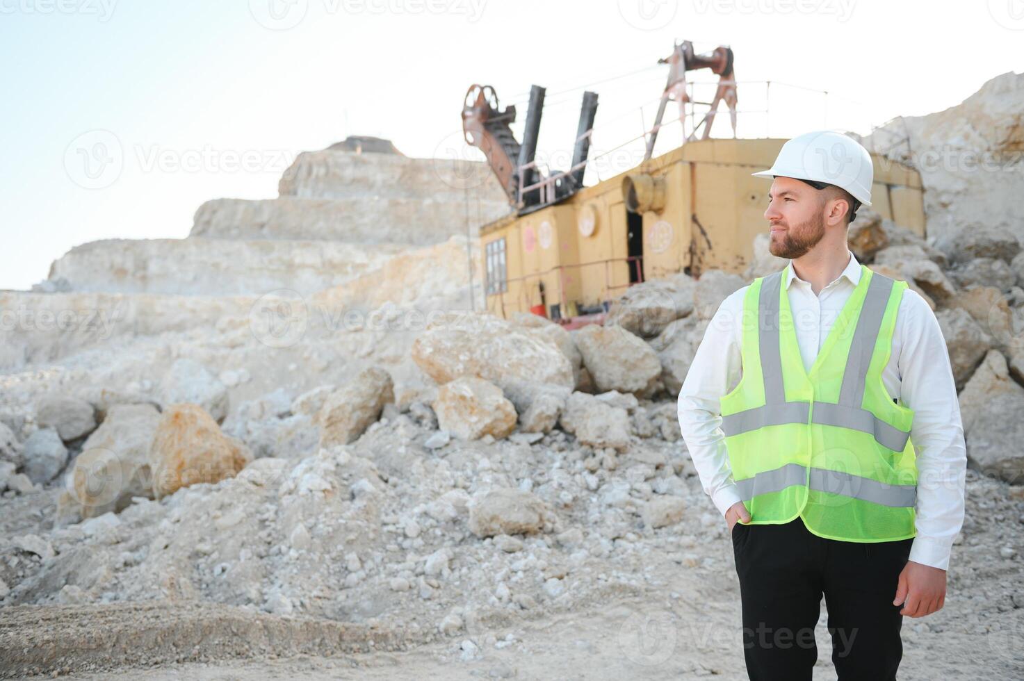 Quarry worker doing a quality check photo