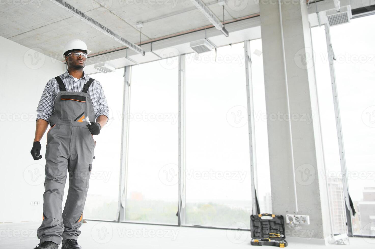 portrait of an African American construction worker on location photo