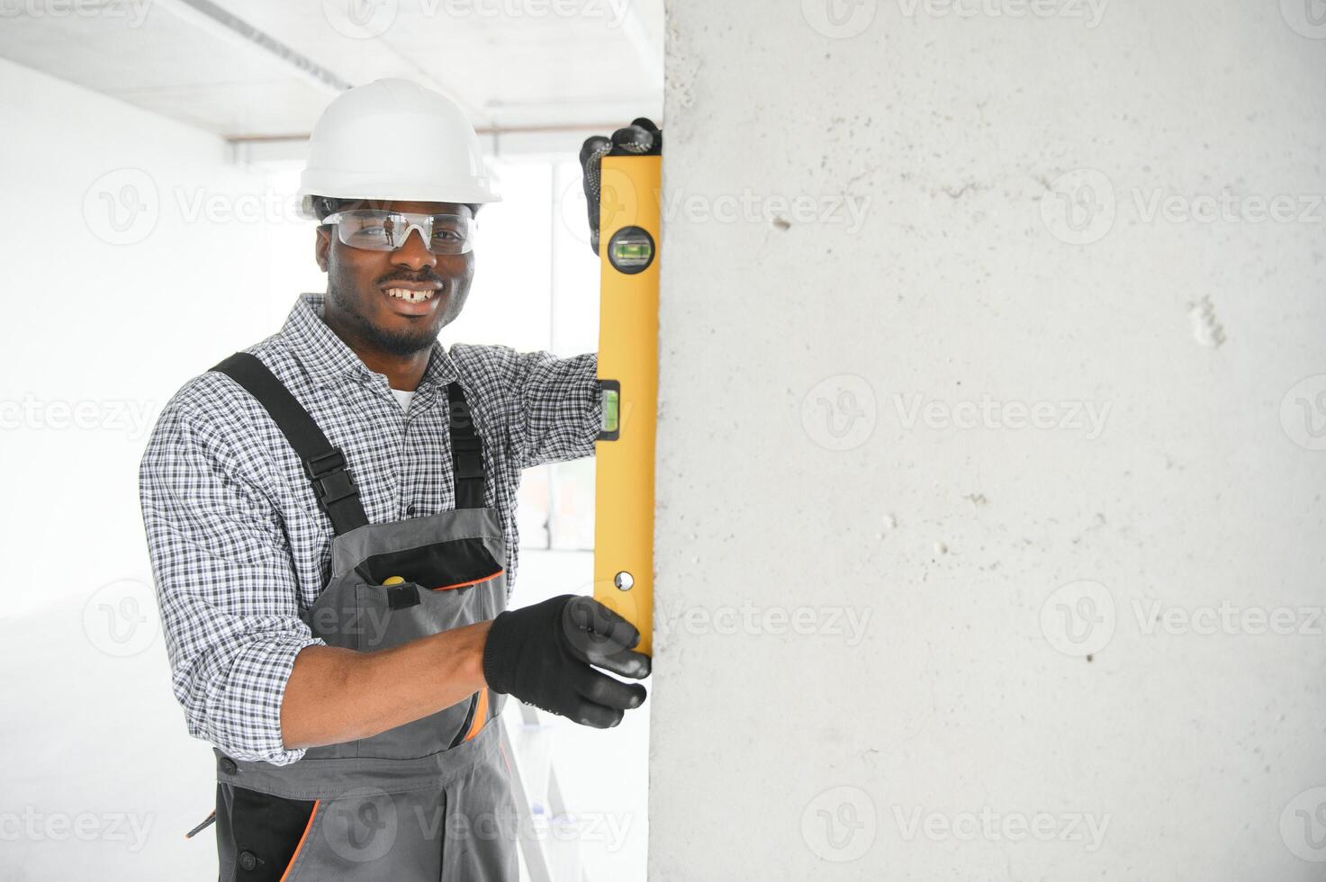 portrait of an African American construction worker on location photo