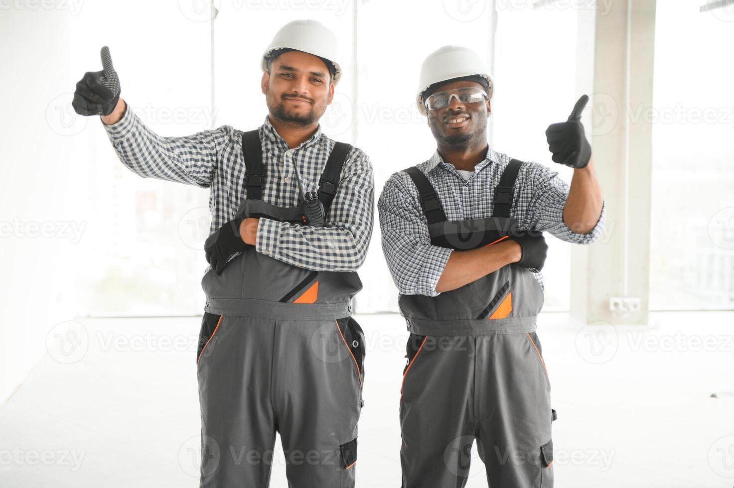 Group of multi ethnic engineer construction site worker meeting at workplace photo