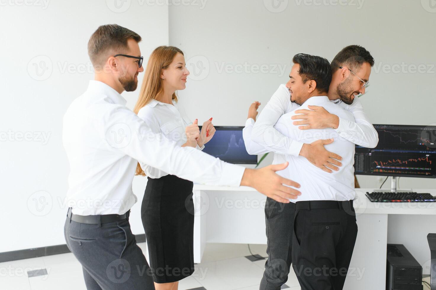 Business people stand on the background of the office corridor photo