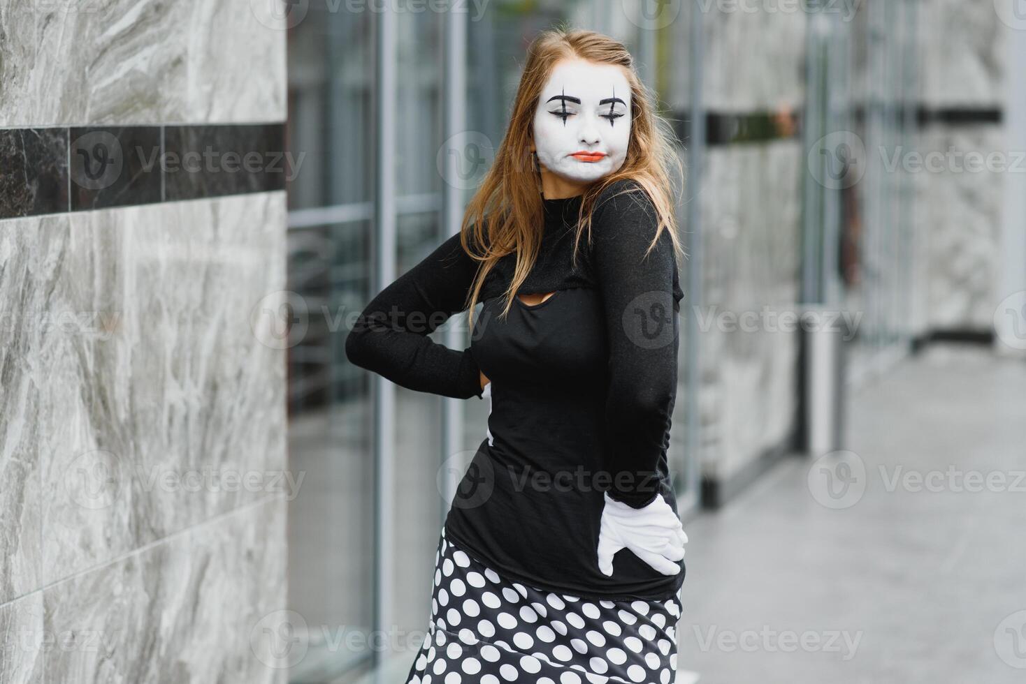 The girl with makeup of the mime. improvisation. photo