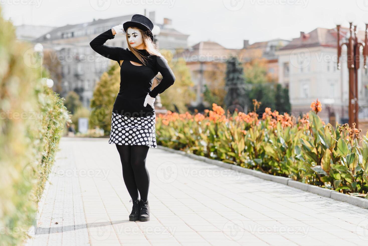 The girl with makeup of the mime. improvisation. mime shows different emotions photo
