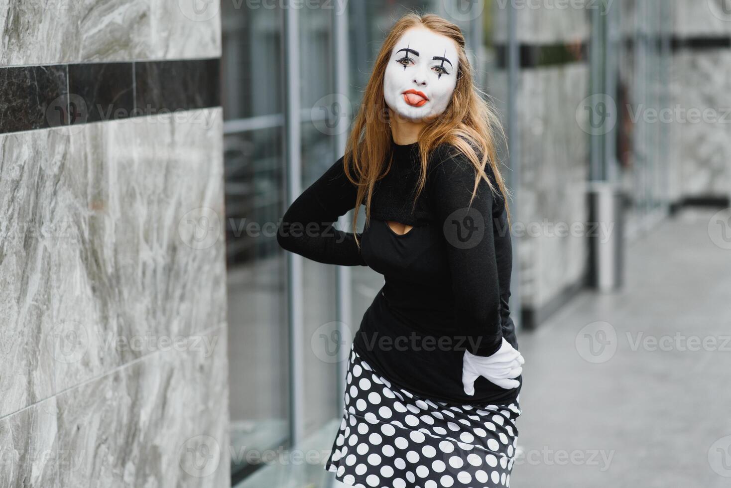 The girl with makeup of the mime. improvisation. photo
