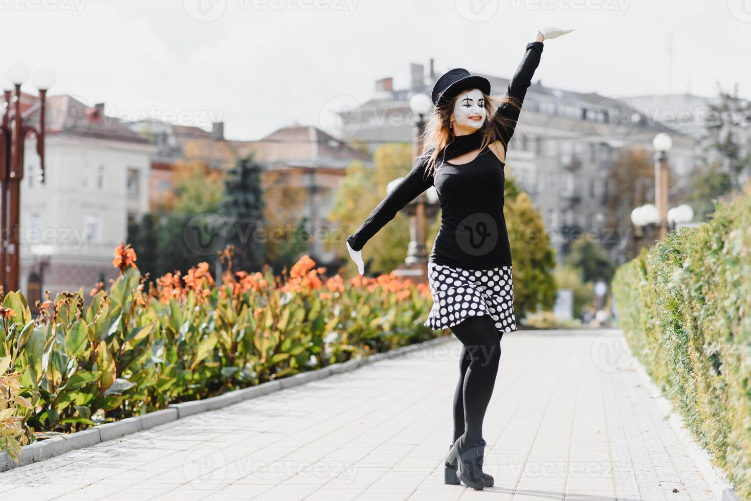 The girl with makeup of the mime. improvisation. mime shows different emotions photo