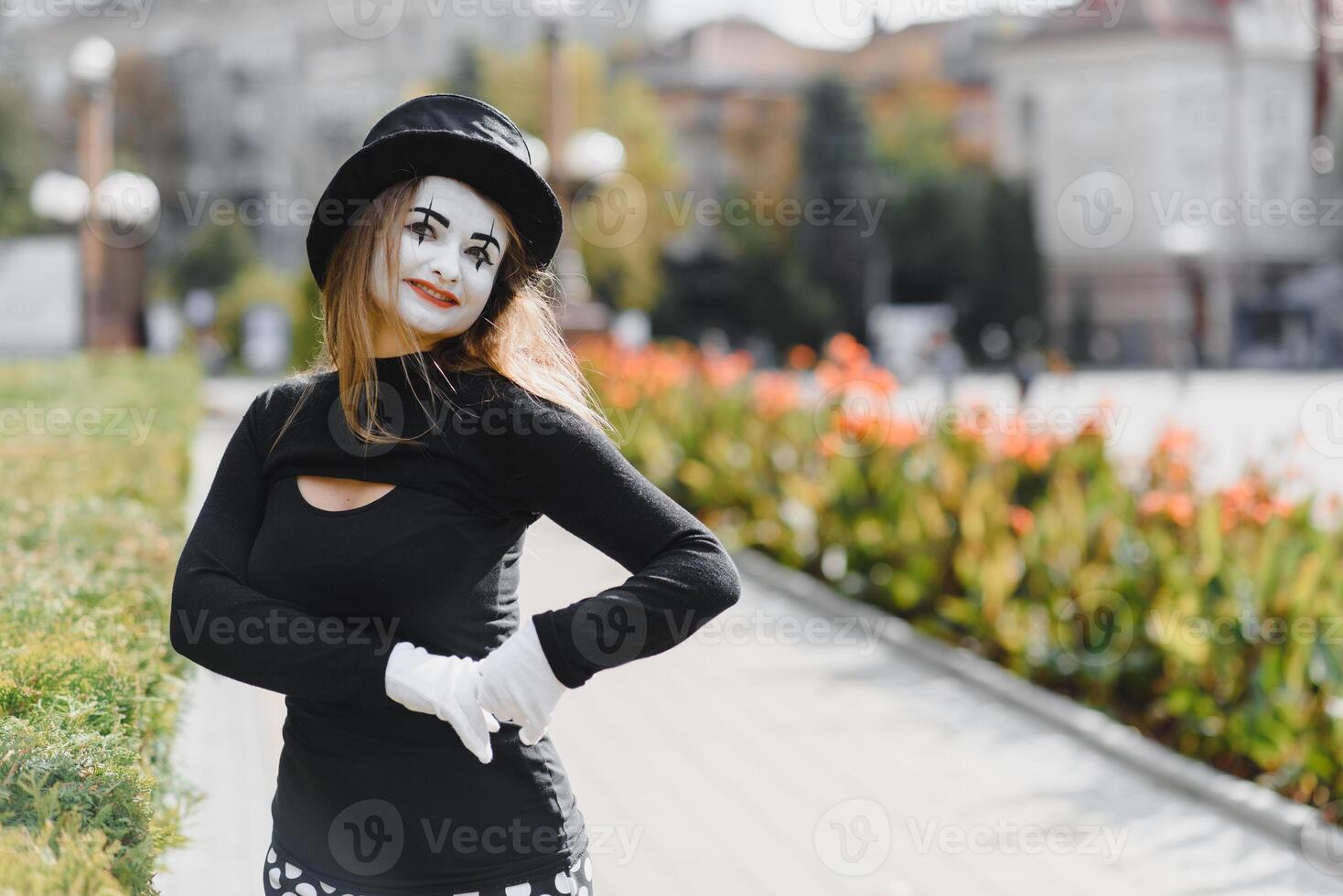 The girl with makeup of the mime. improvisation. mime shows different emotions photo