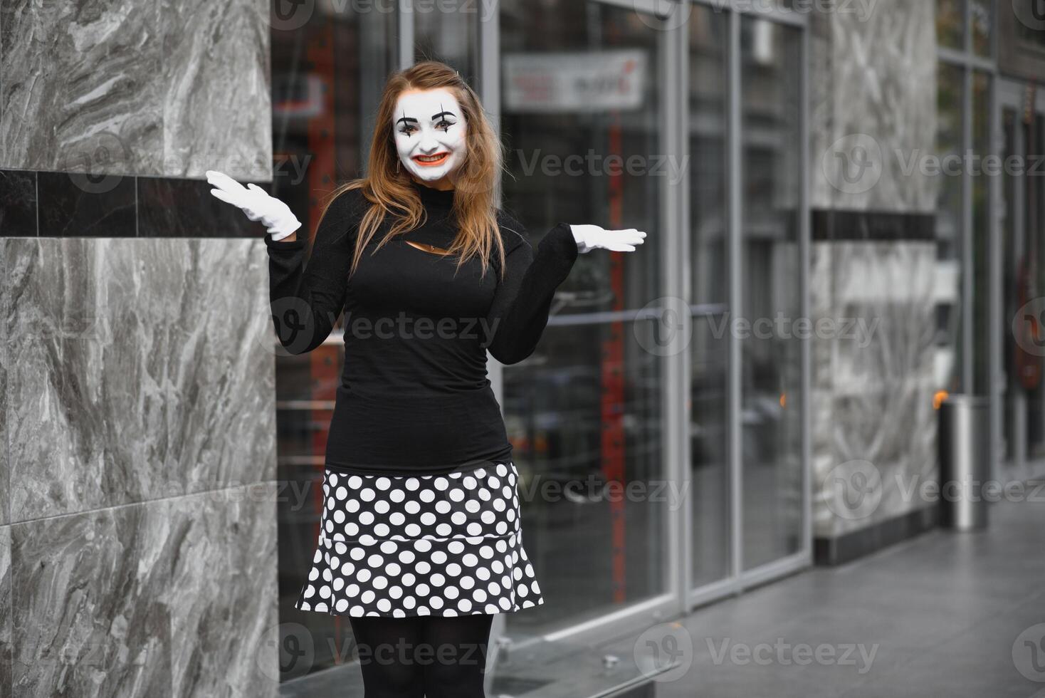 The girl with makeup of the mime. improvisation. photo