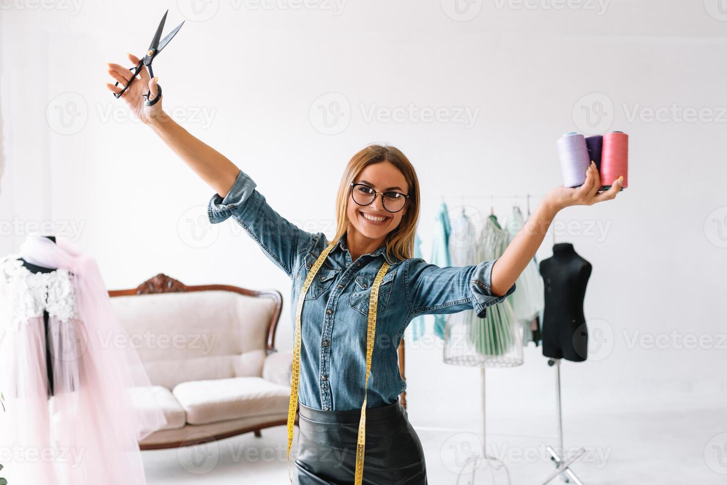 Fashion designer working in the studio photo