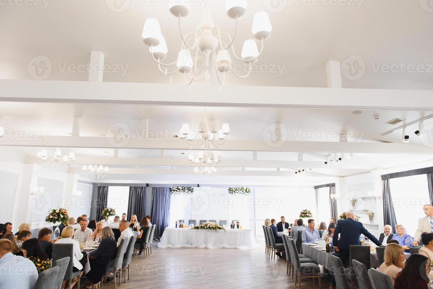 an image of tables setting at a luxury wedding hall photo