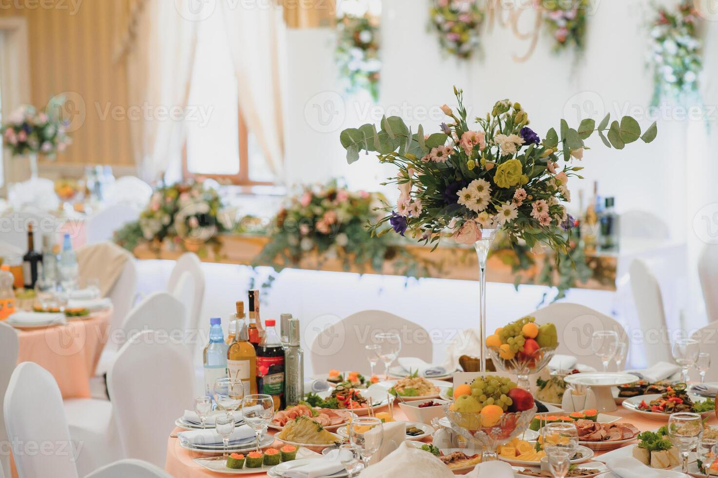 an image of tables setting at a luxury wedding hall photo