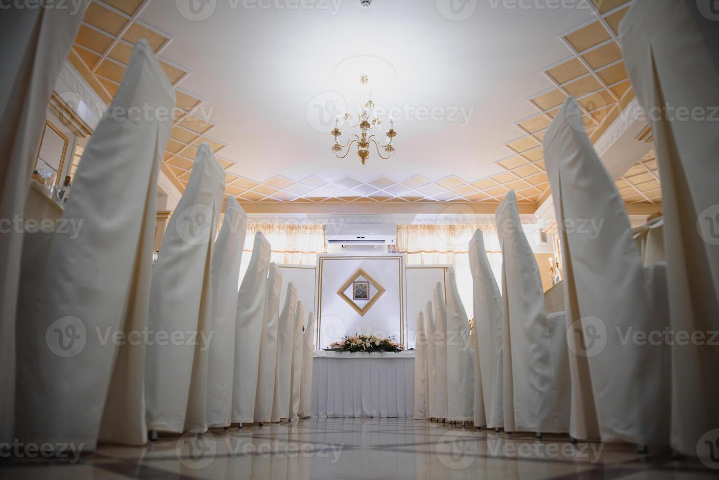 an image of tables setting at a luxury wedding hall photo