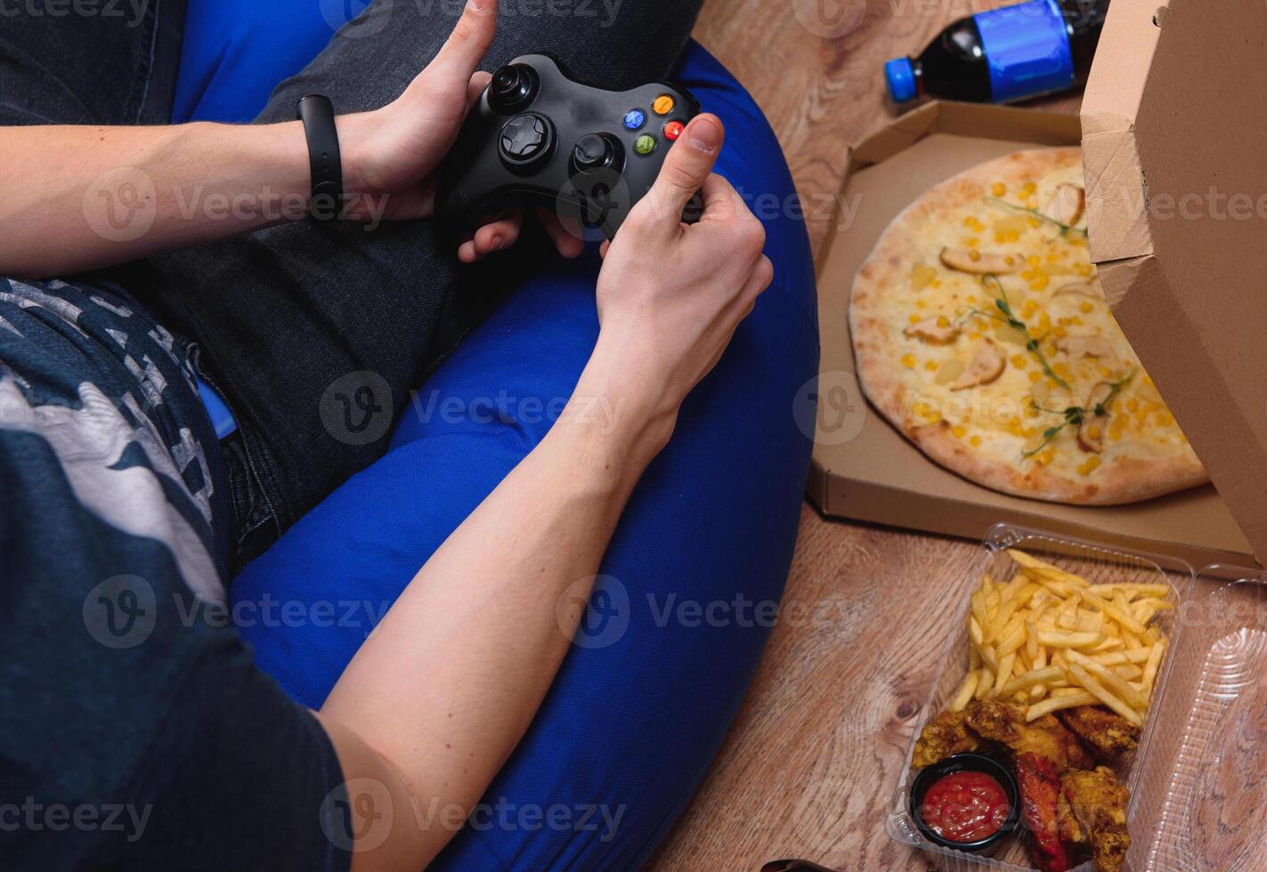 contactless delivery concept. Pizza in a box, a cup of coffee, a phone with the inscription stay home and a sheet of paper with the inscription contactless delivery. photo