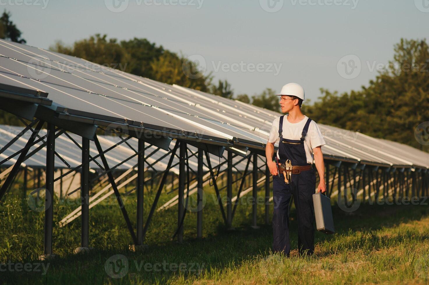 Renewable energy and solar power concept, worker or Electrical engineers are checking and training installing photovoltaic plant in solar power station alternative energy from nature photo