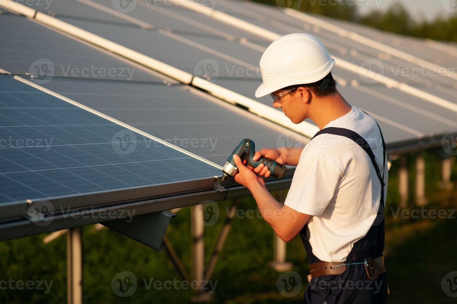 Renewable energy and solar power concept, worker or Electrical engineers are checking and training installing photovoltaic plant in solar power station alternative energy from nature photo