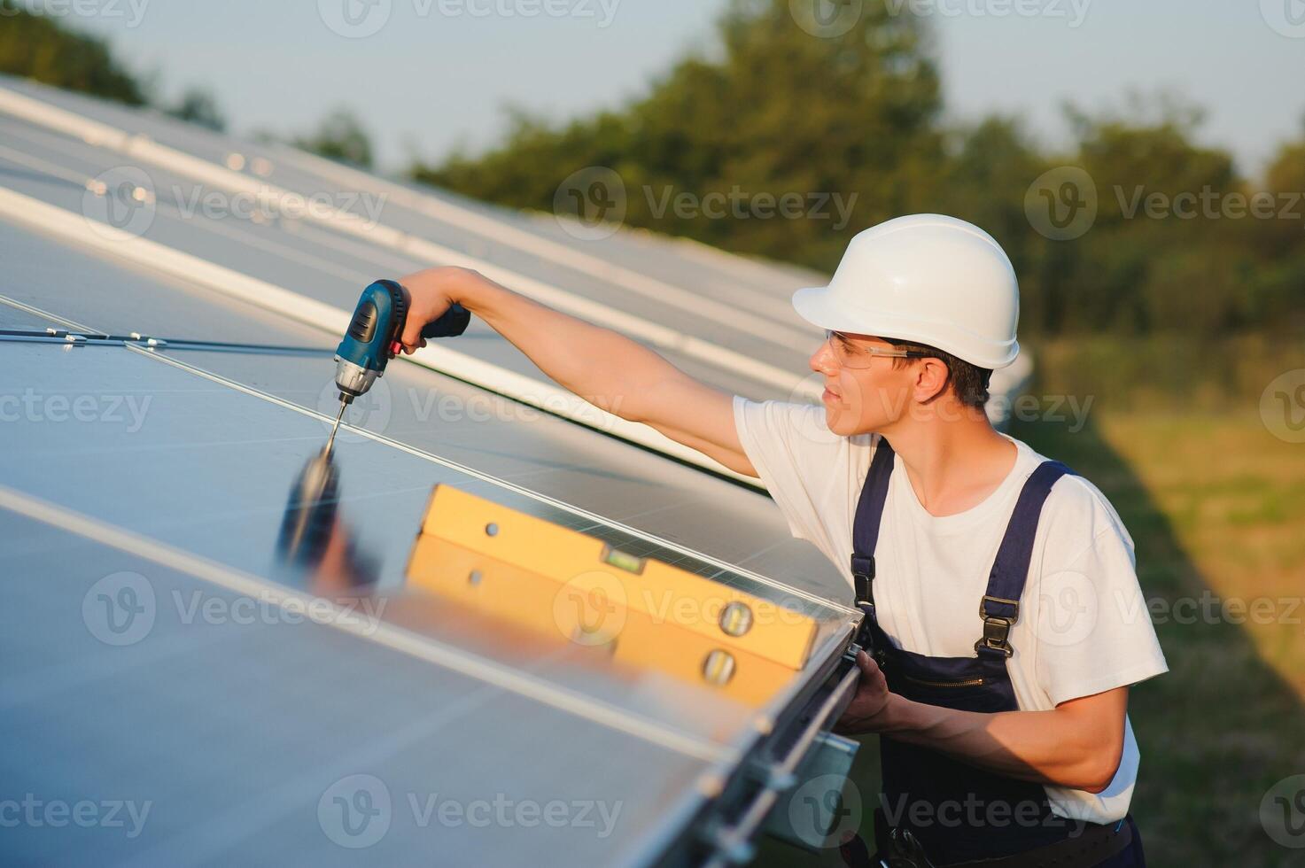 Renewable energy and solar power concept, worker or Electrical engineers are checking and training installing photovoltaic plant in solar power station alternative energy from nature photo