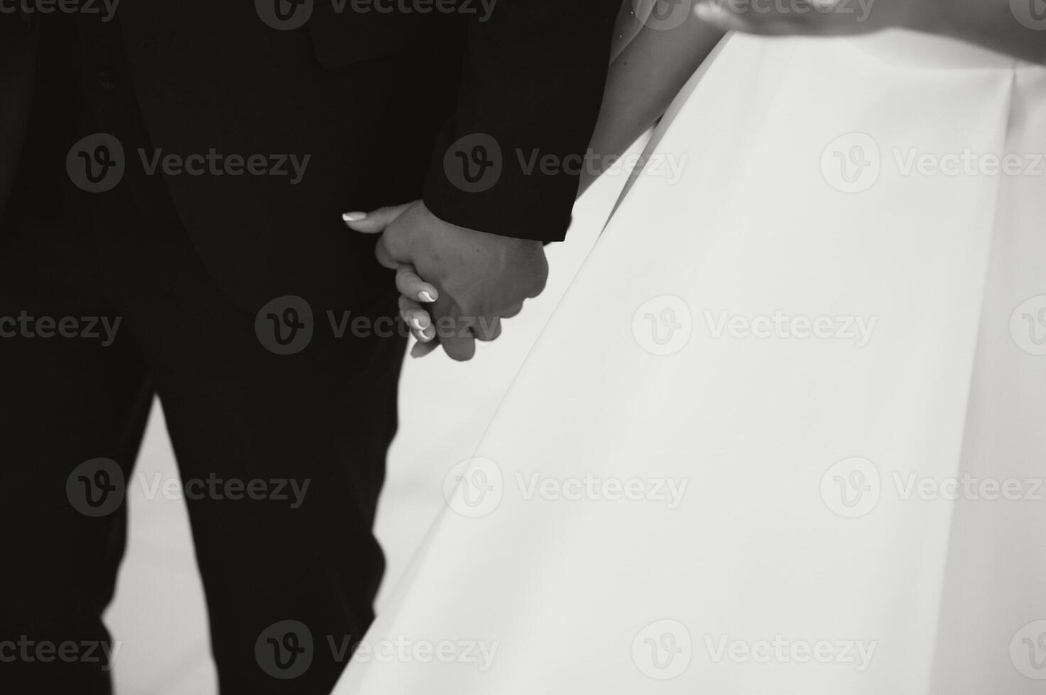 Hands of the bride and groom close-up. photo