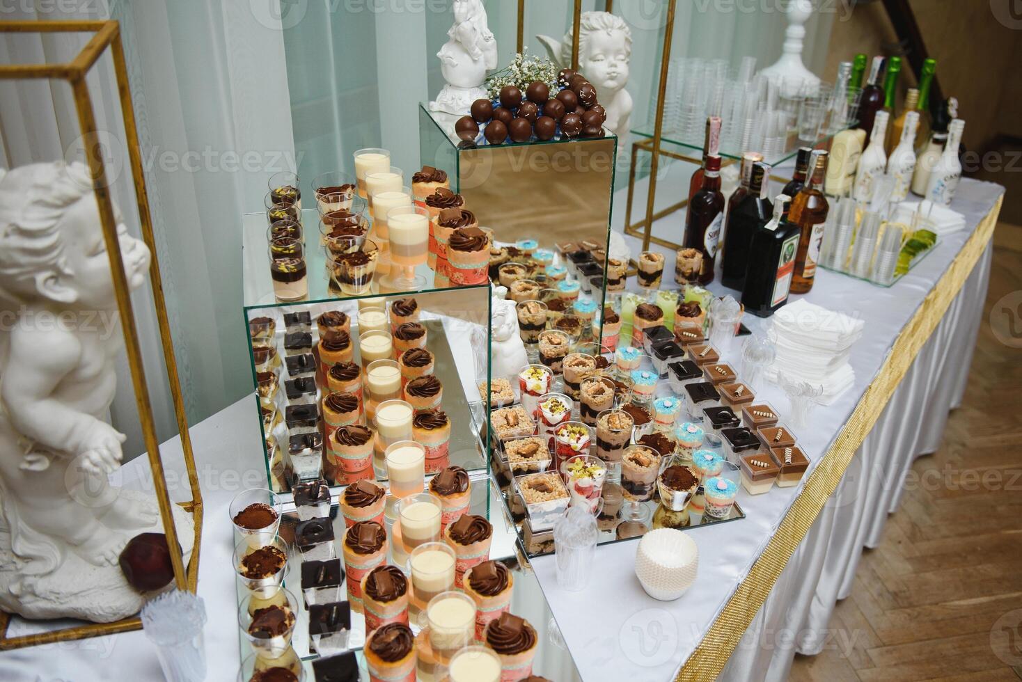 various dessert with fresh fruit on buffet line, sweet. photo