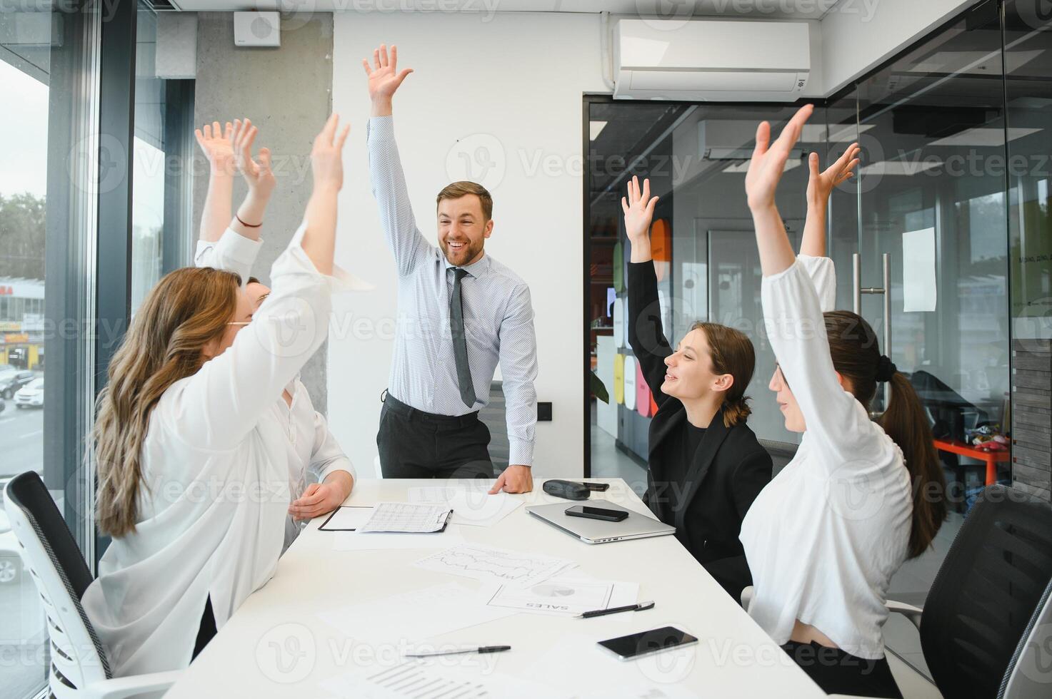 Corporate business team and manager in a meeting room at modern office with panoramic windows. Business concept photo