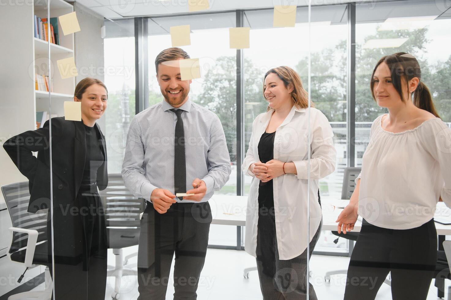 Group of young people in business meeting photo