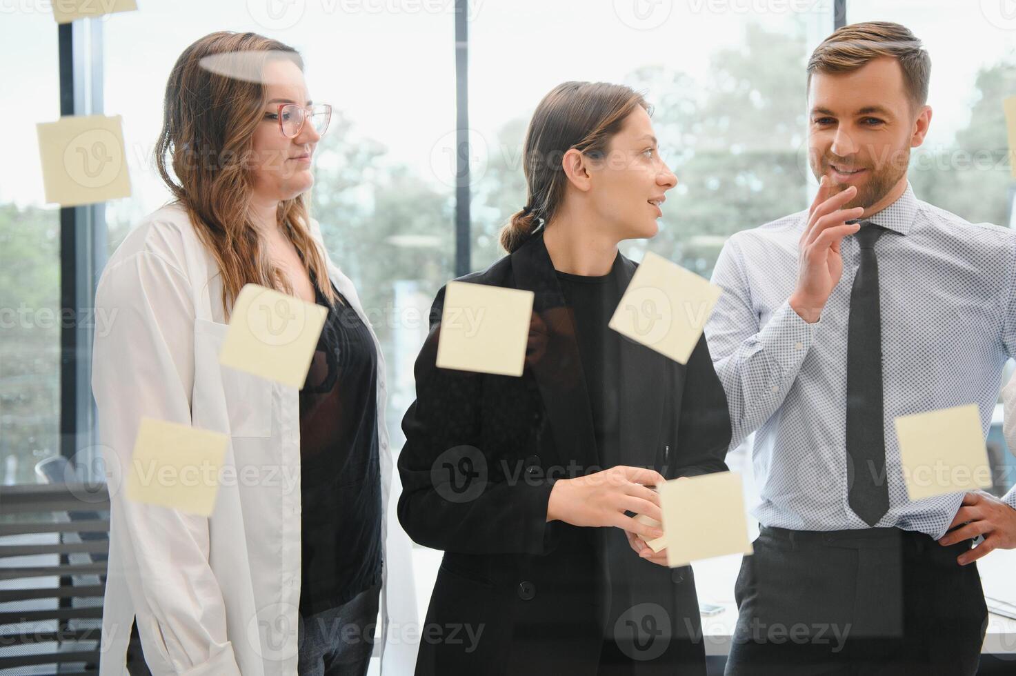 Corporate business team and in a meeting at modern office with big windows . High quality photo
