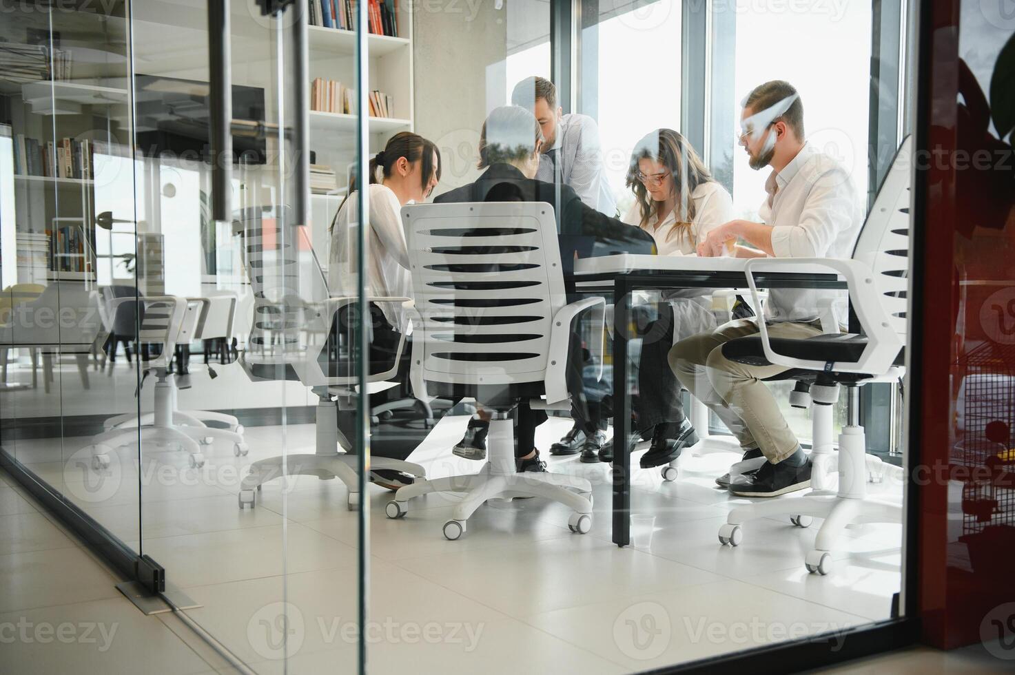 A group of business people partners during a set team meeting in the modern office. Teamwork concept photo