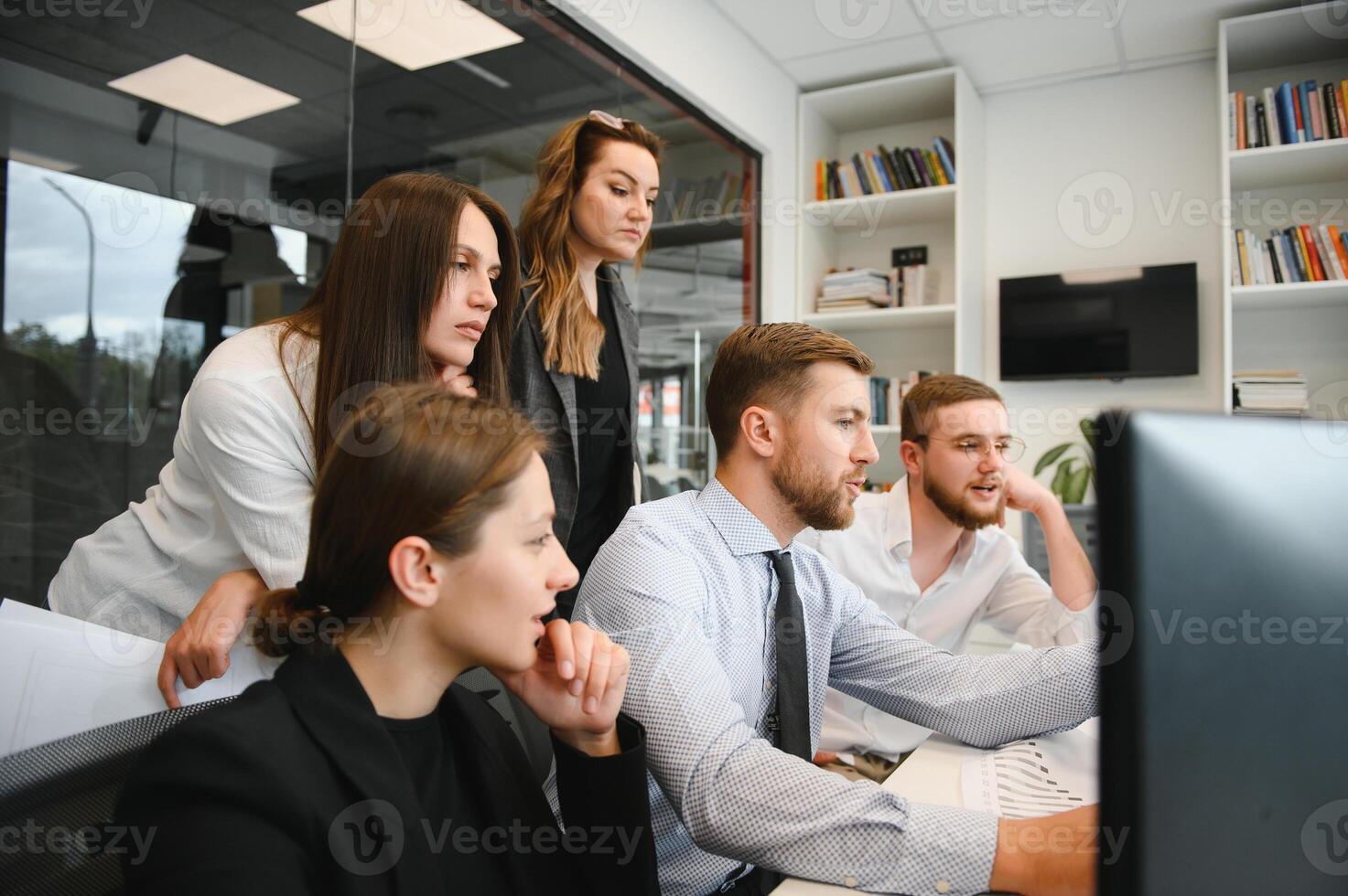 Business people working on project in office photo