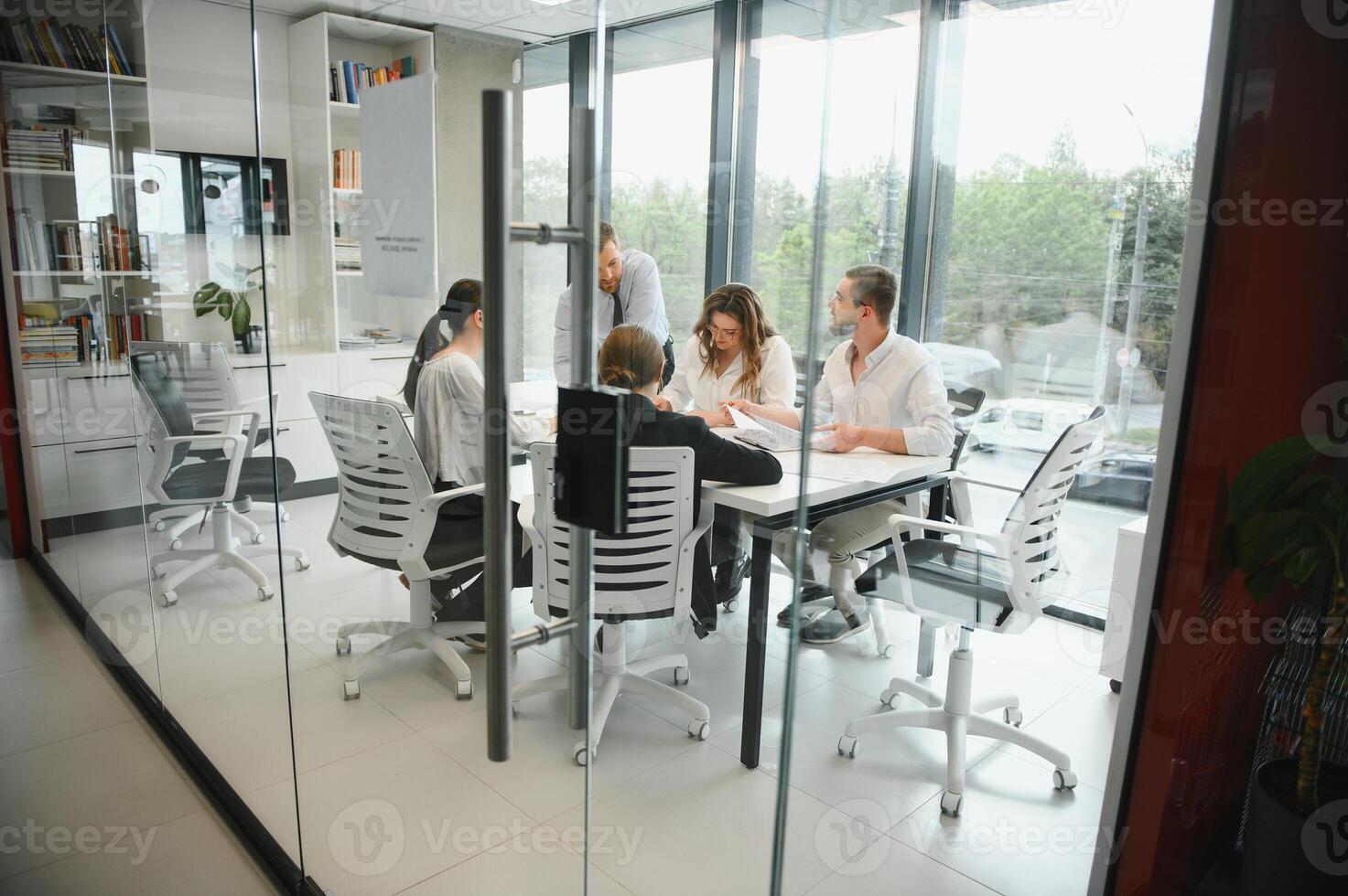 Business people working on project in office photo