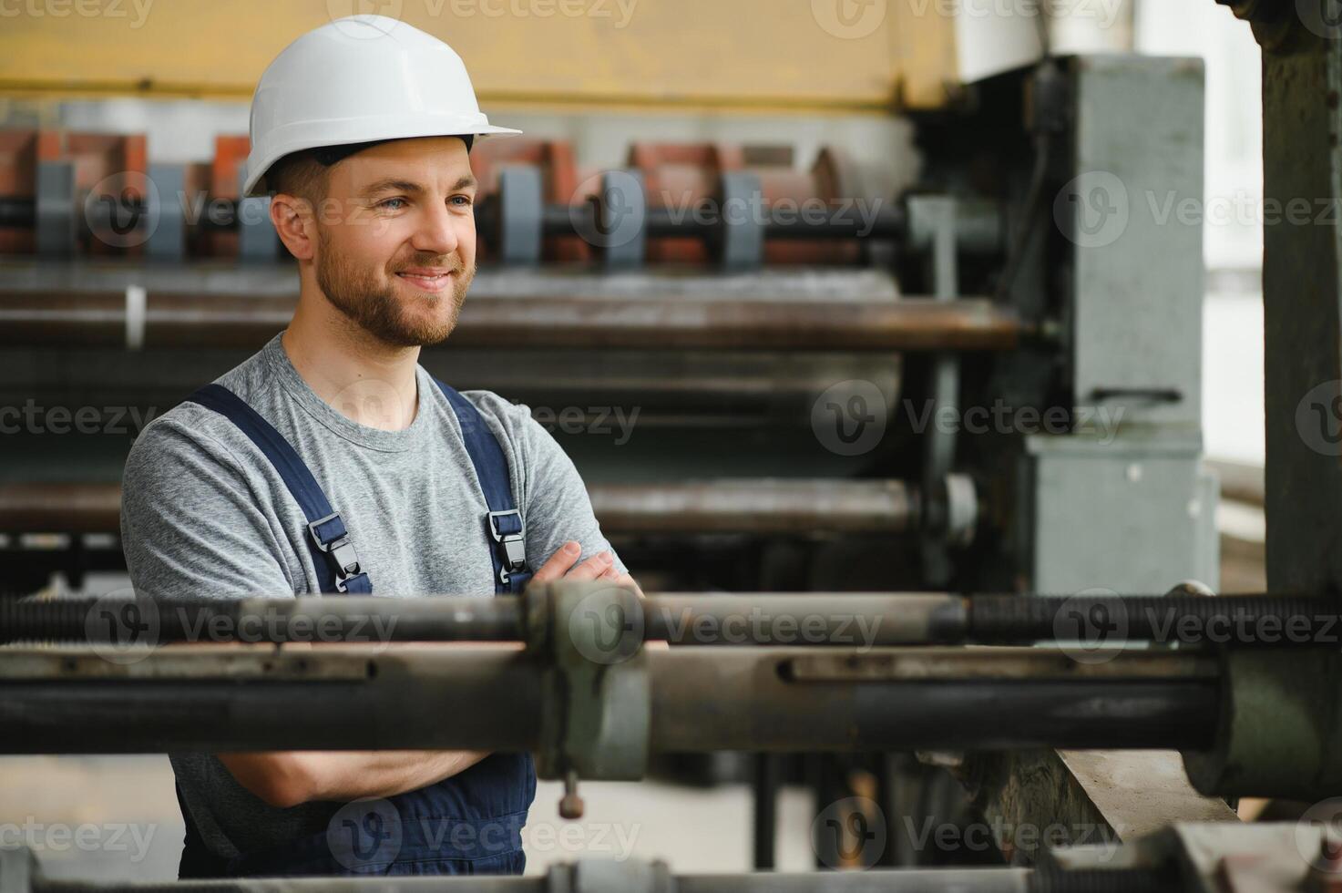 Factory worker. Man working on the production line. photo
