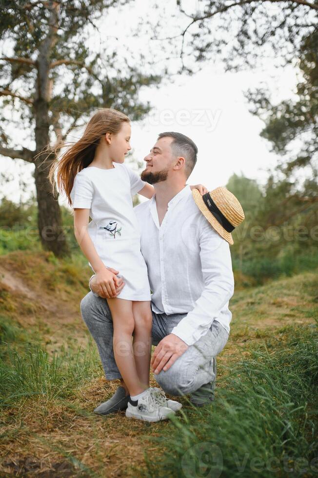 Father and daughter in nature photo
