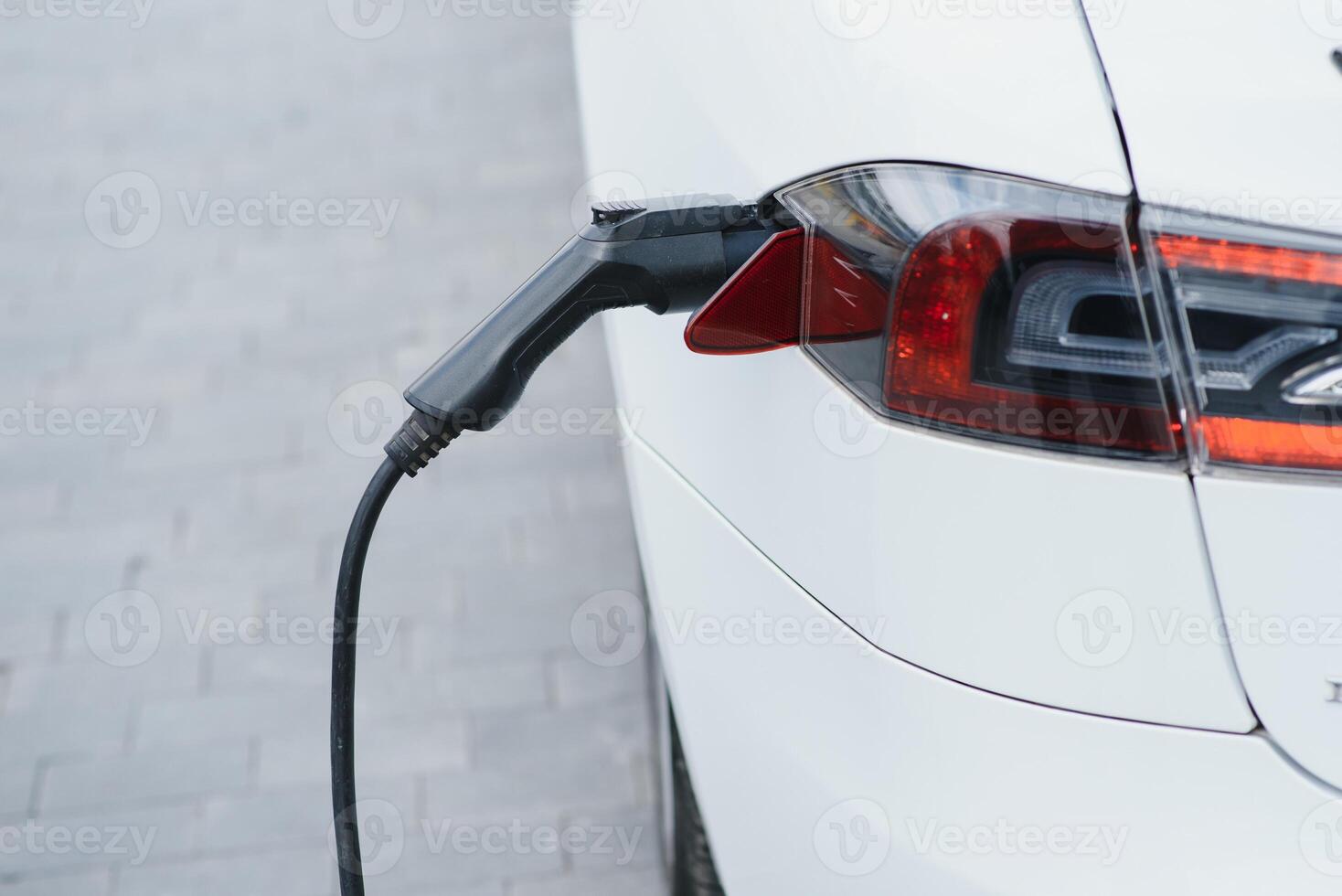 Close up image of the power socket of an electric car, charging photo