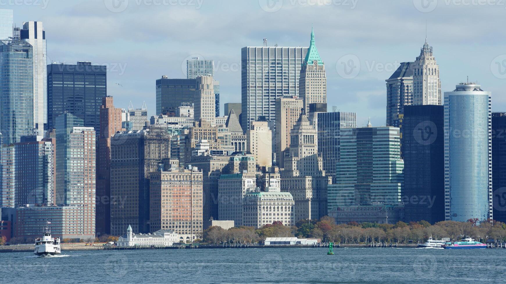 The New York manhattan view from the ferry boat in the sunny day photo