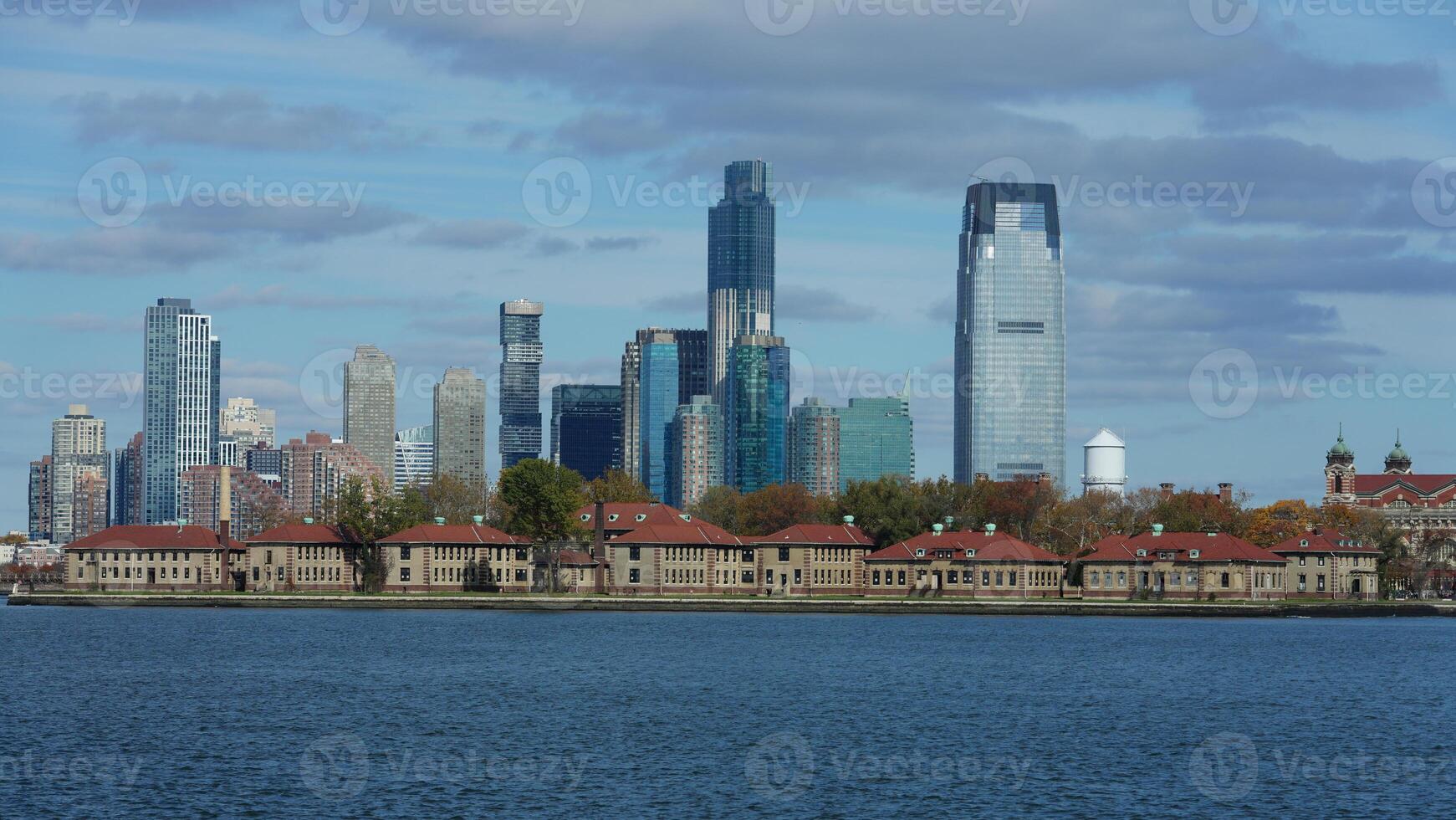 The New York manhattan view from the ferry boat in the sunny day photo