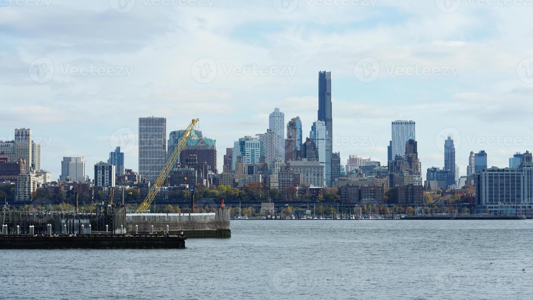 The New York manhattan view from the ferry boat in the sunny day photo