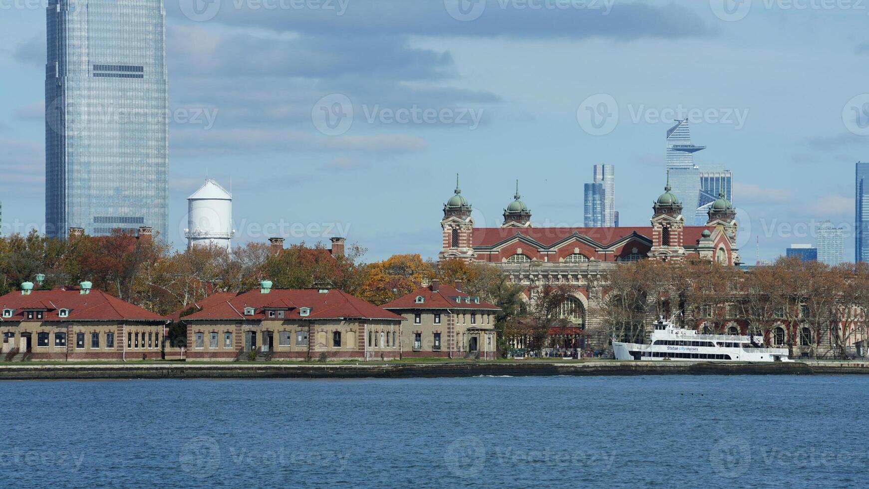 The beautiful New York city view with the colorful autumn trees and buildings as background in autumn photo