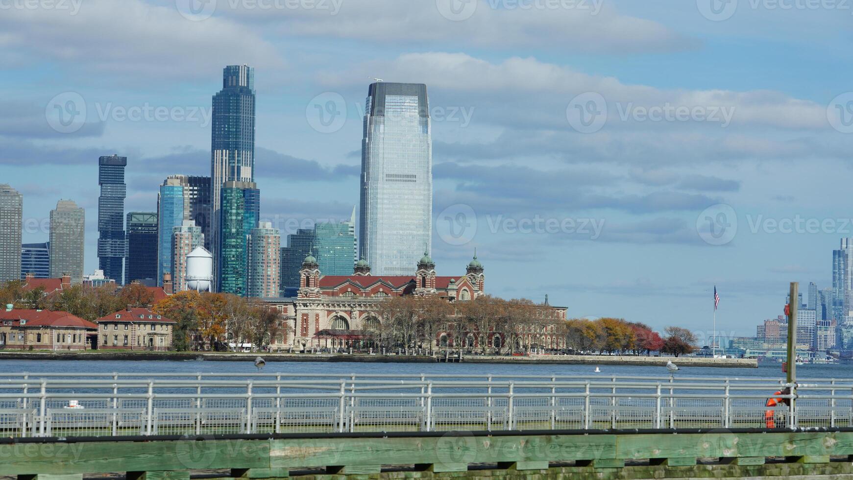 The New York manhattan view from the ferry boat in the sunny day photo