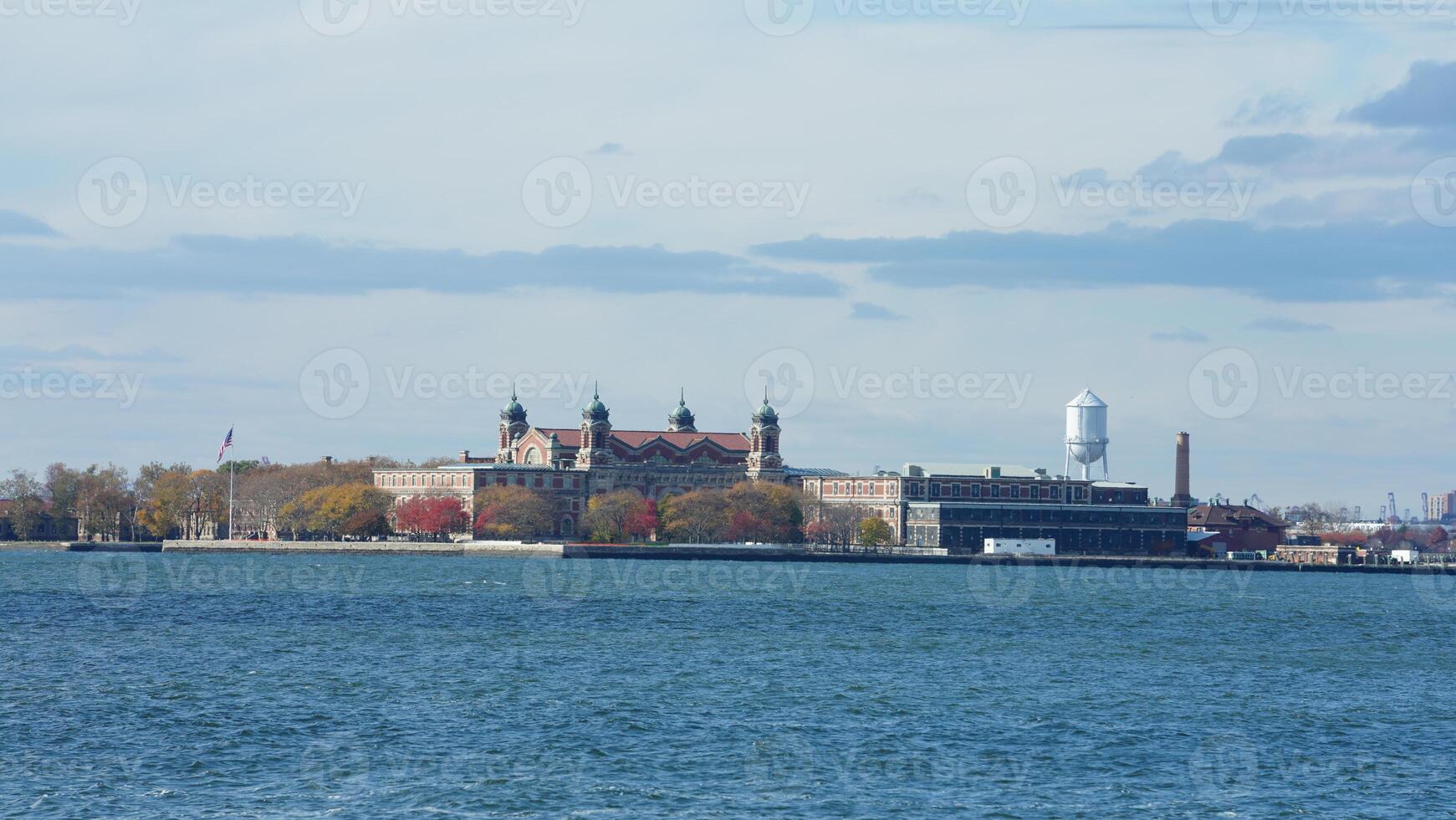 The New York manhattan view from the ferry boat in the sunny day photo