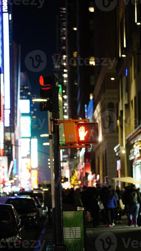 The New York city night view with the lights on in the skyscrapers at night photo