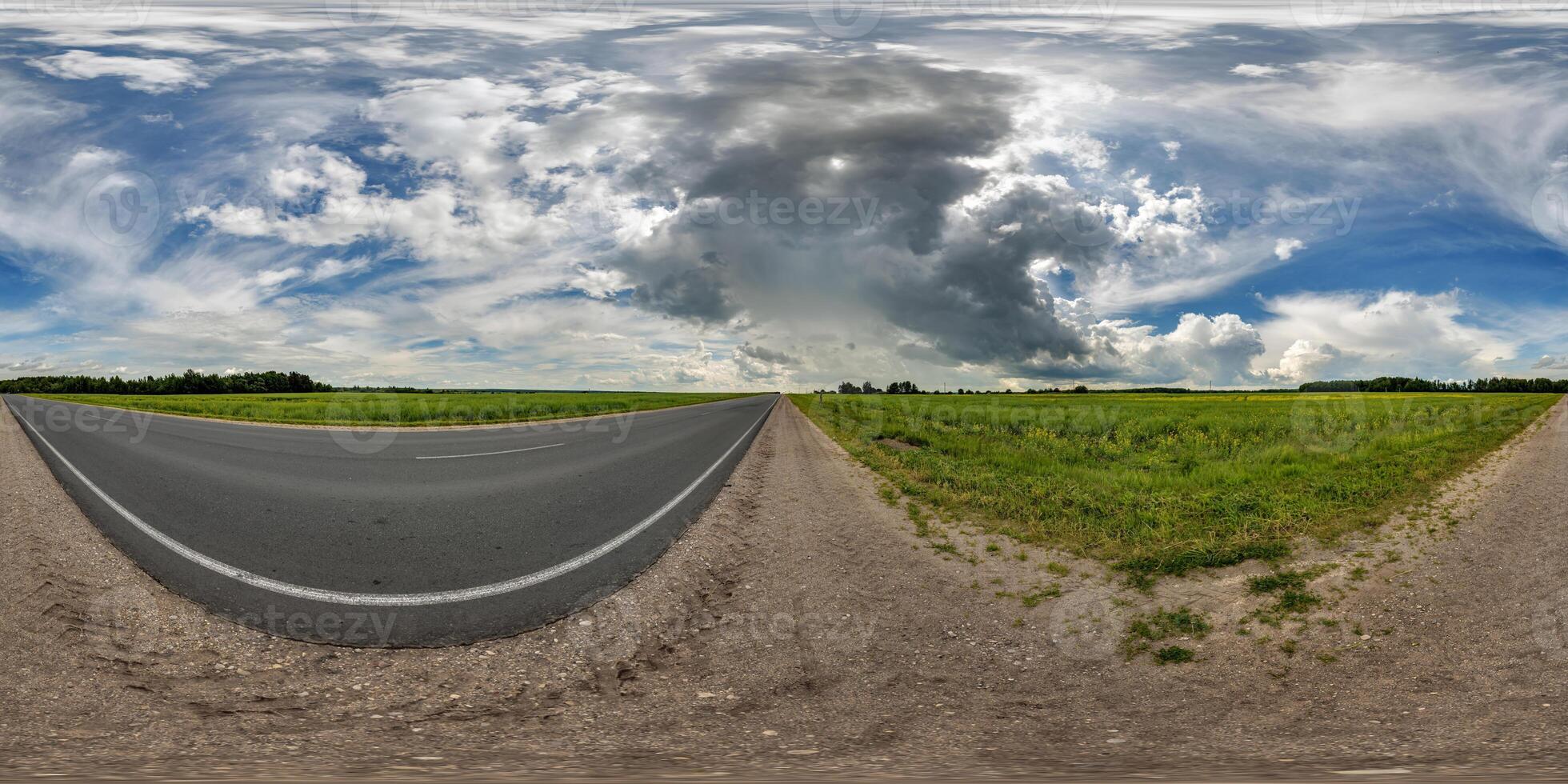 spherical 360 hdri panorama on side of asphalt road with rain storm clouds in dark sky in equirectangular seamless projection, as skydome replacement in drone panoramas, game development photo