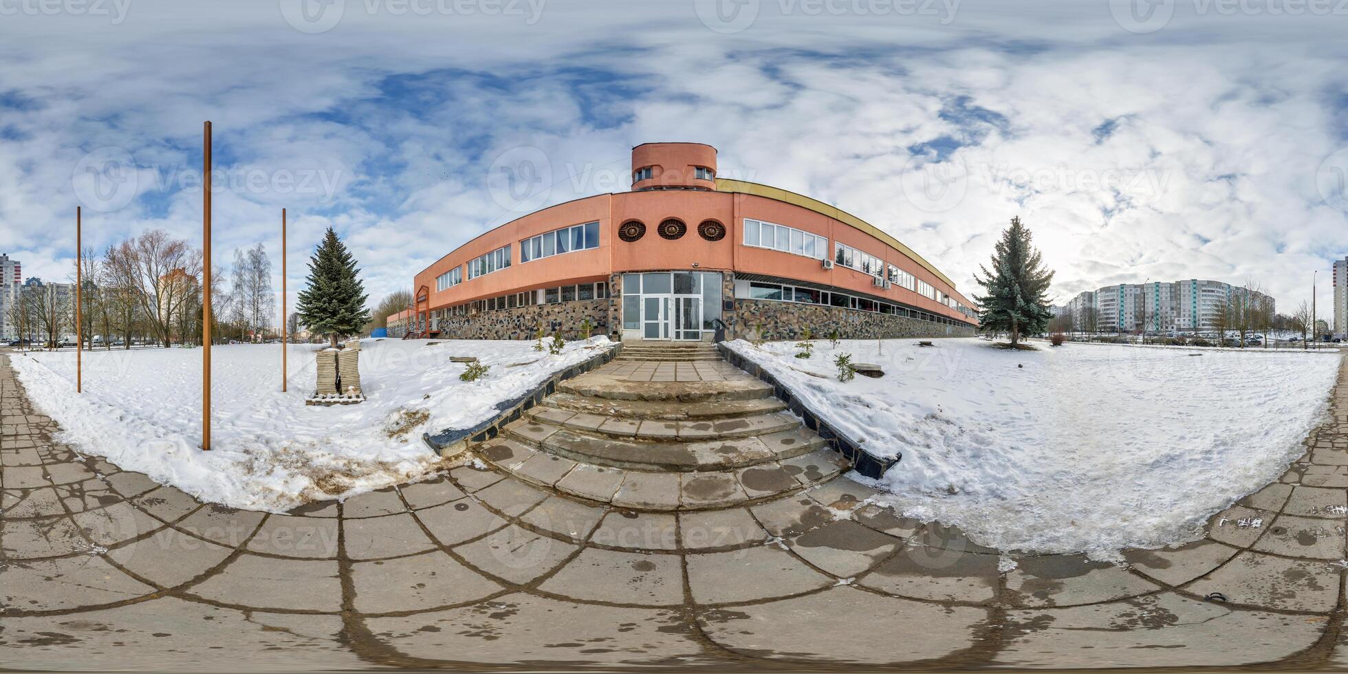 winter hdri 360 panorama view near an old soviet brutalist building and urban development in equirectangular seamless spherical projection, AR VR content photo