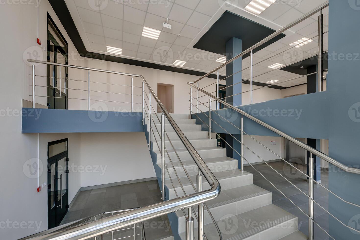 stairs emergency and evacuation exit stair in up ladder in a new office building photo