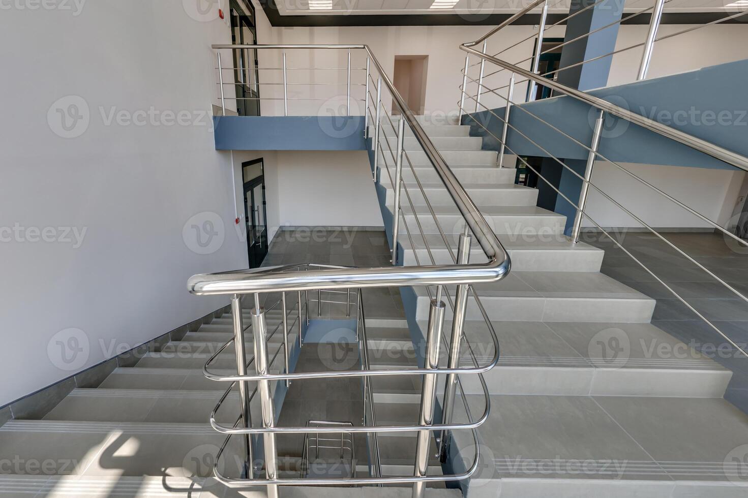 stairs emergency and evacuation exit stair in up ladder in a new office building photo