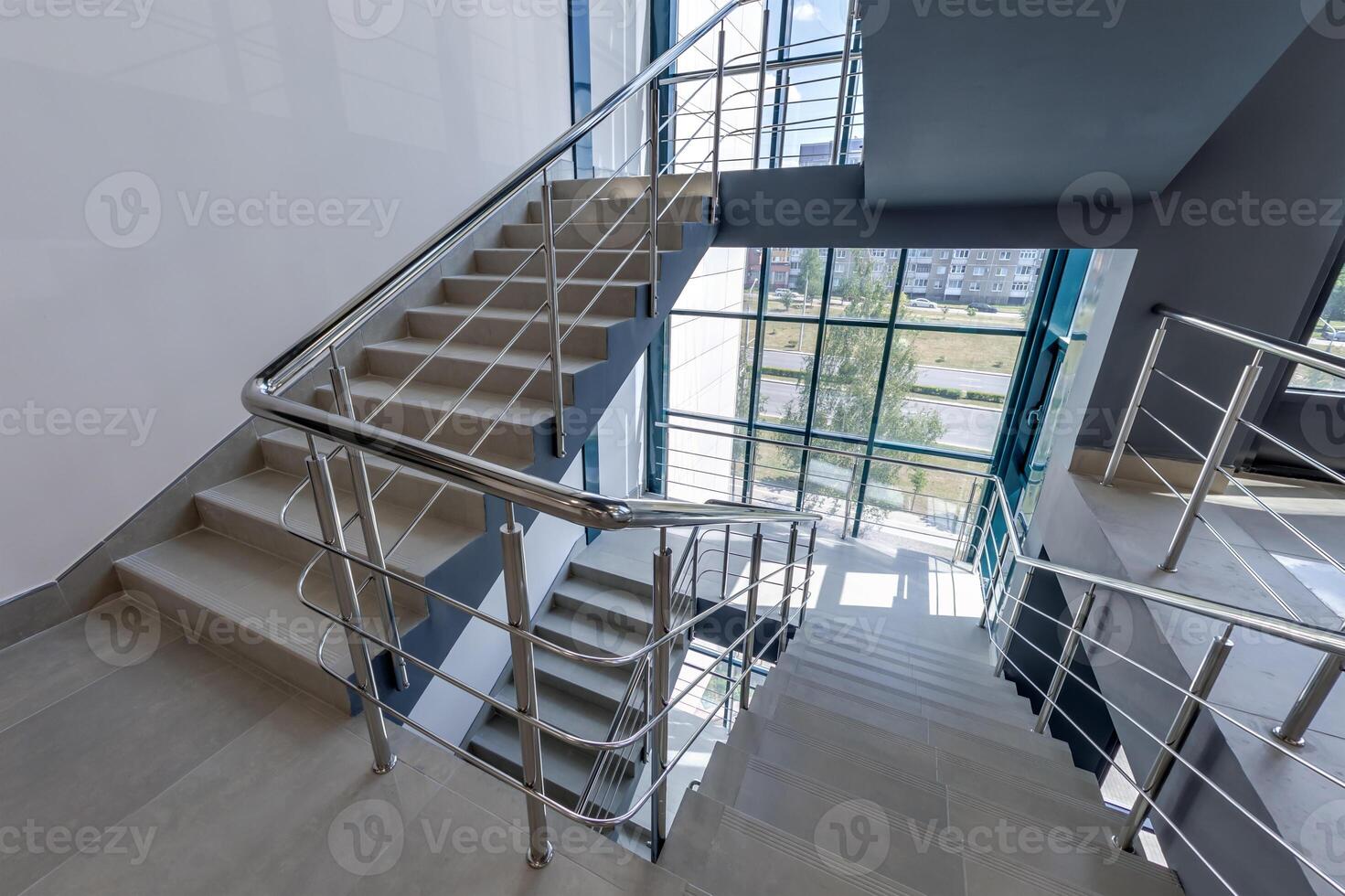stairs emergency and evacuation exit stair in up ladder in a new office building photo