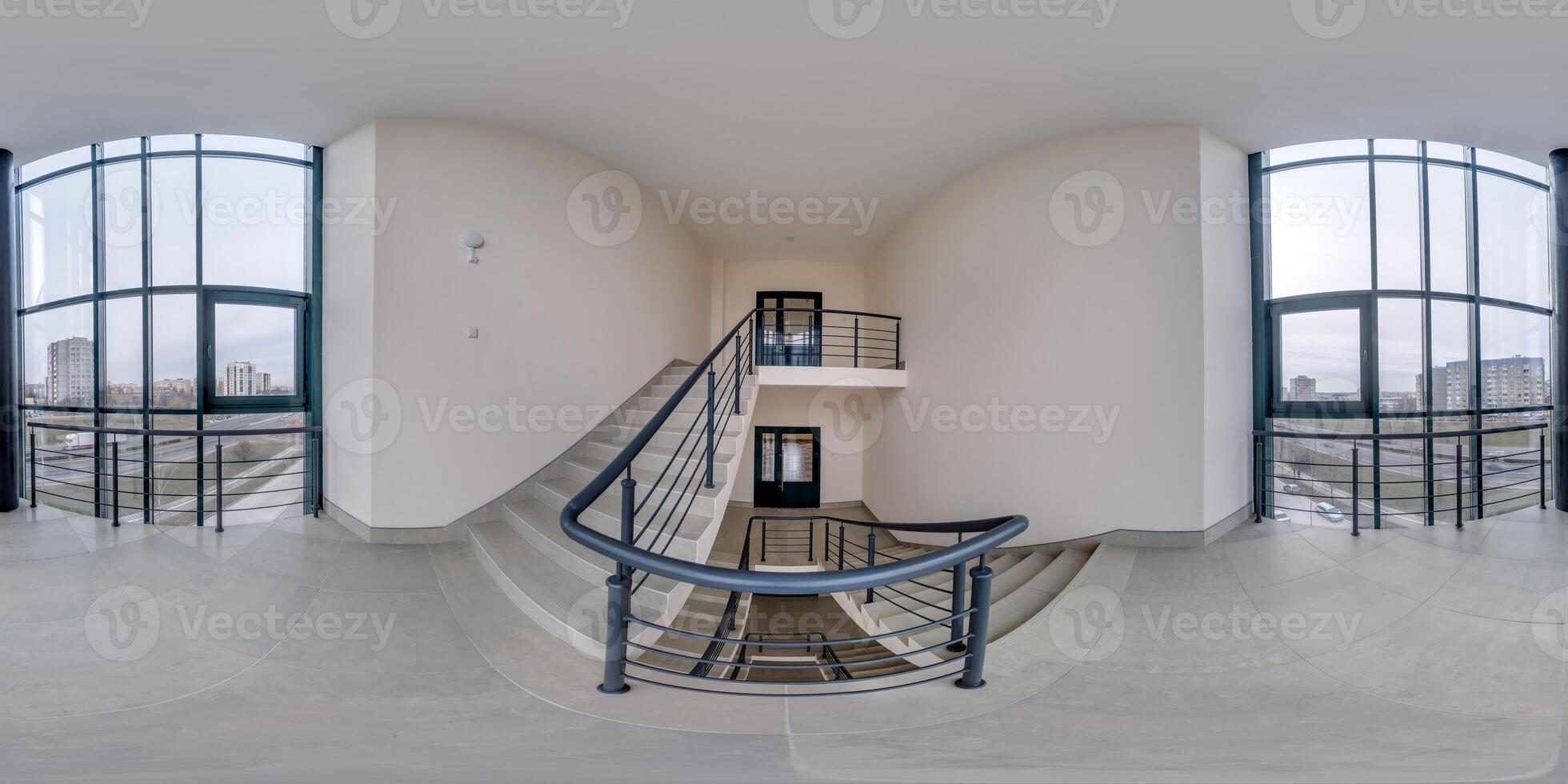 hdri 360 panorama view in empty modern hall near panoramic windows with columns, staircase and doors in equirectangular full spherical projection, ready for AR VR content photo