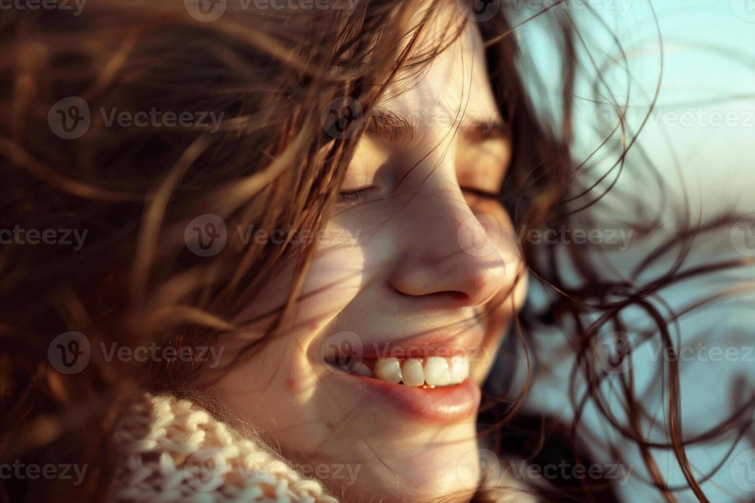 Happy woman enjoying the moment, smiling face, wind is in the hair, sun shining on the face. Bucket lifestyle concept photo