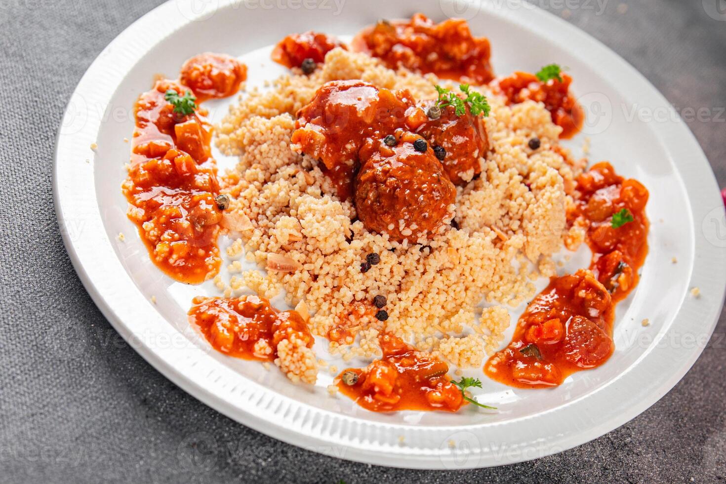 couscous food meat balls vegetable sauce tasty fresh meal snack on the table copy space food background rustic top view photo