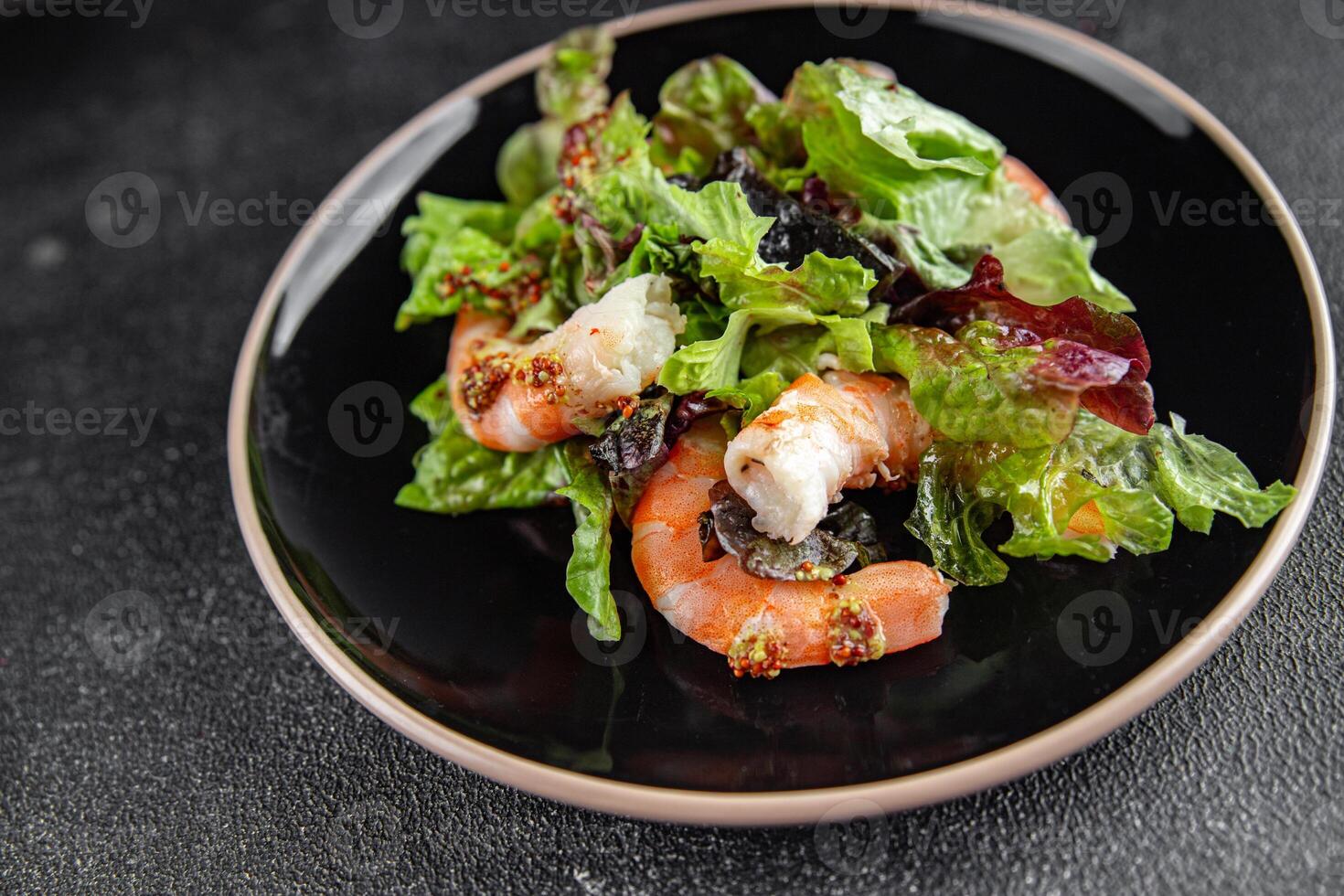 salad shrimp or prawns langoustines green leaf lettuce mix fresh meal food snack on the table photo