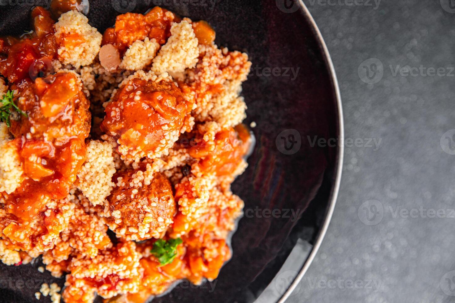couscous food meat balls vegetable sauce tasty fresh meal snack on the table copy space food background rustic top view photo