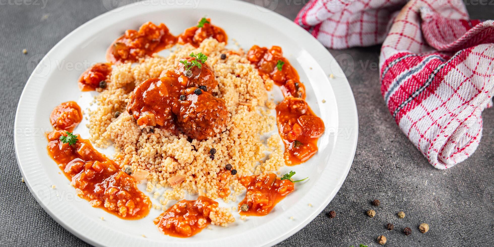 couscous with meat balls vegetable sauce tasty fresh meal food snack on the table copy space food background rustic top view keto or paleo diet photo