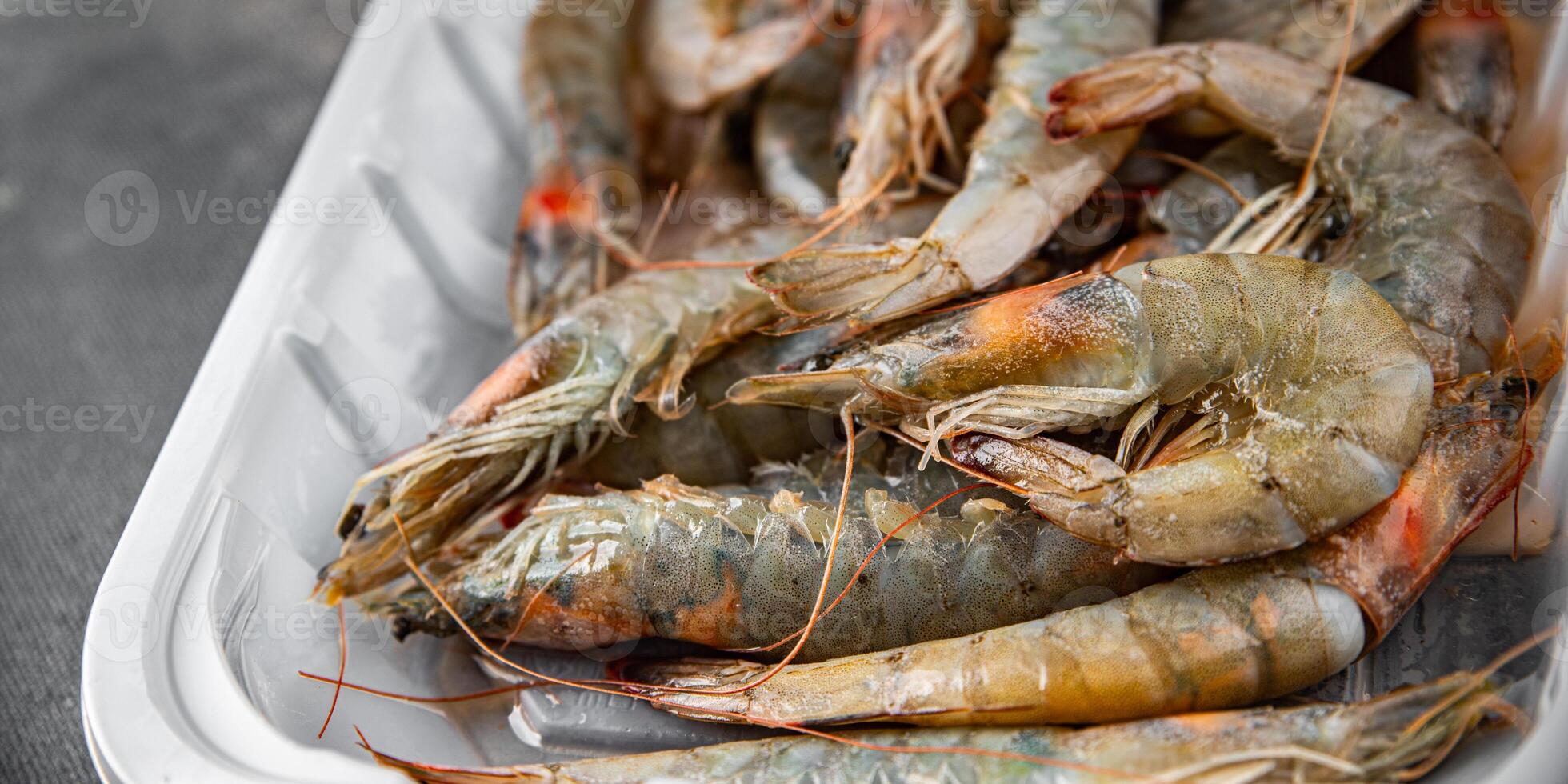 shrimp raw seafood prawns natural food fresh appetizer meal food snack on the table copy space food background rustic keto or paleo diet Pescetarian photo