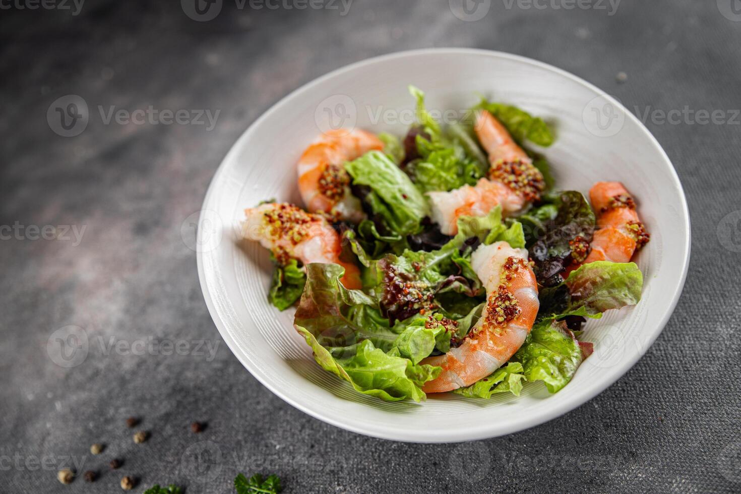 salad shrimp or prawns langoustines green leaf lettuce mix fresh meal food snack on the table photo